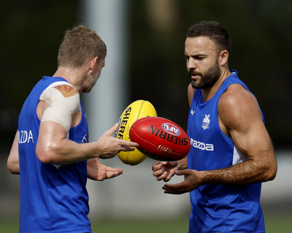 The Kangaroos are hoping defender Griffin Logue (right) can escape a one-match ban.