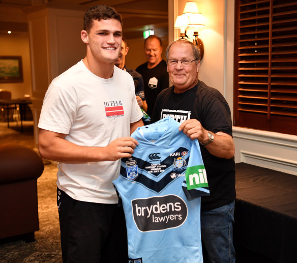 Experience: Tom Raudonikis, right, presents NSW halfback Nathan Cleary with his jersey for Origin III.