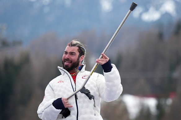 Patrick Halgren celebrates on the podium after winning the silver medal in the alpine skiing men’s super-G standing at the 2026 Winter Paralympics in Cortina d’Ampezzo.