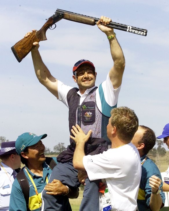 Australian shooter Michael Diamond celebrates after winning the gold medal in the men's trap final at the Sydney International Shooting Centre. 