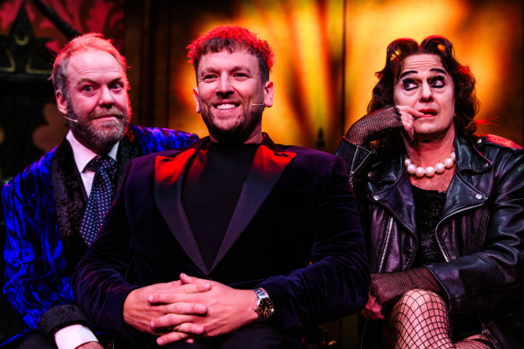 Peter Helliar (left) and Dylan Alcott, who both play the narrator, with Jason Donovan, who plays Frank-N-Furter.