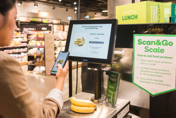 Apps like Woolworths’ Scan&Go let shoppers add their goods to an online shopping basket and pay as they walk around the store.