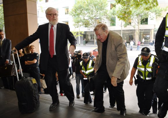 Robert Richter QC and Cardinal George Pell arrives at the Melbourne Magistrates Court last week.