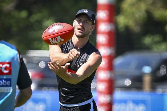 New man: Former Giant Harry Perryman officially began on the tools with Collingwood at training on Monday.