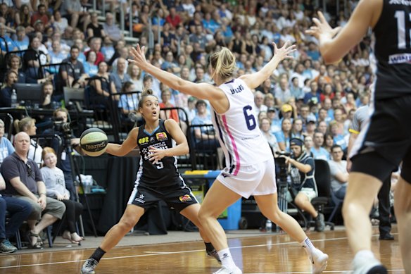 Capitals' Leilani Mitchell and Adelaide Lightning's Steph Blicavs. 
