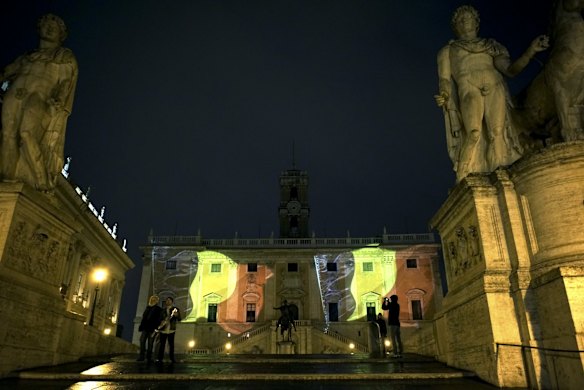 Two Belgian flags are projected on Rome's Campidoglio Capitol Hill to honour the victims of the deadly attacks in Brussels.