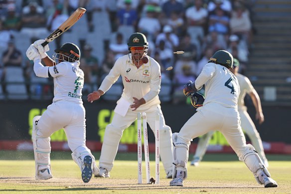 South Africa’s captain Temba Bavuma is bowled out by Nathan Lyon.
