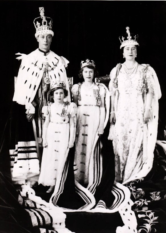 Queen Elizabeth, the Queen Mother, poses with her husband  King George VI,  and their two daughters, Princess Elizabeth and Princess Margaret, following the King's coronation, in 1937.