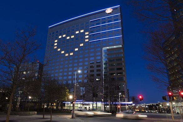 Windows in the Renaissance Boston Waterfront Hotel are illuminated in a heart shape during the coronavirus outbreak, in Boston. (AP Photo/Michael Dwyer)