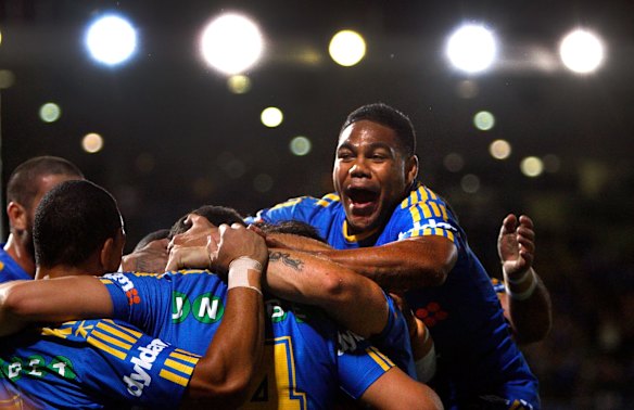Chris Sandow celebrates a four-pointer.