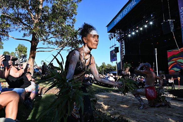 Dancers from Kari perform as part of the smoking ceremony by Koomurri at the Wugulora morning ceremony at Barangaroo.