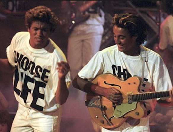 The iconic "Choose Life" t-shirt from 'Wake Me Up Before You Go-Go' was an anti-suicide and anti-drugs PSA teens actually want to wear. Created by British designer and activist Katherine Hamnett. Hamnett remains an influence for many artists today, including Kanye West.