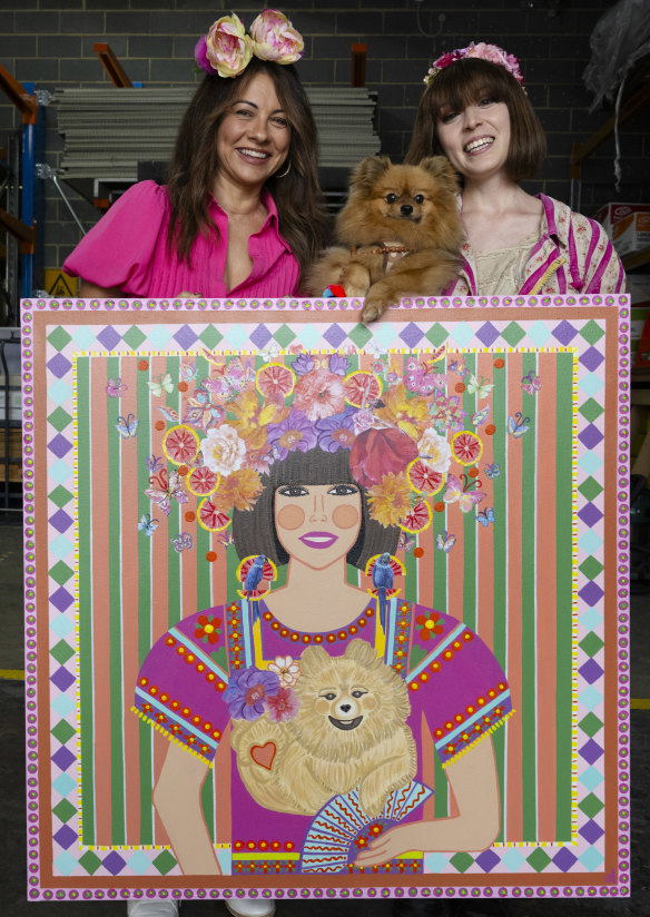 Artist Vera Arbinja, with sitter Elysia Aravena and Benji the dog, delivers her work to the loading dock of the Art Gallery of NSW.