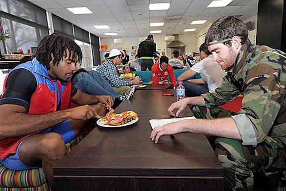 Collingwood footballers Harry O'Brien and Tyson Goldsack during Mad Monday celebrations after the Magpies won their first premiership in 20 years against St Kilda. 