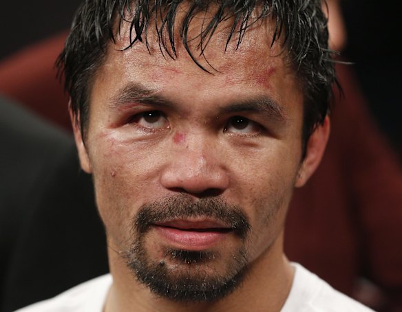 The vanquished: Manny Pacquaio waits for the decision.