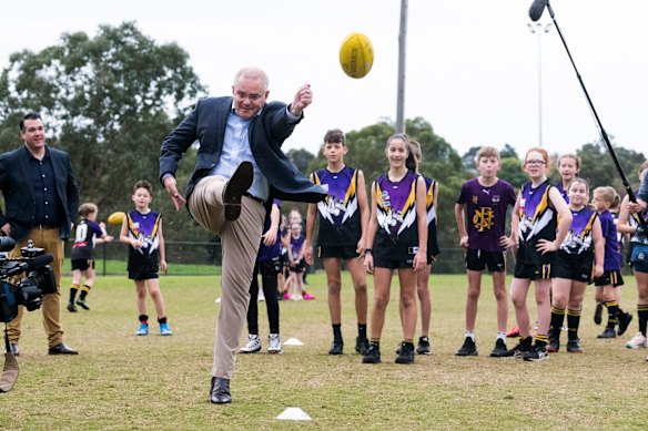 Australian Prime Minister Scott Morrison visits Norwood Sporting Club, in the seat of Deakin, with the Northwood Football Club.