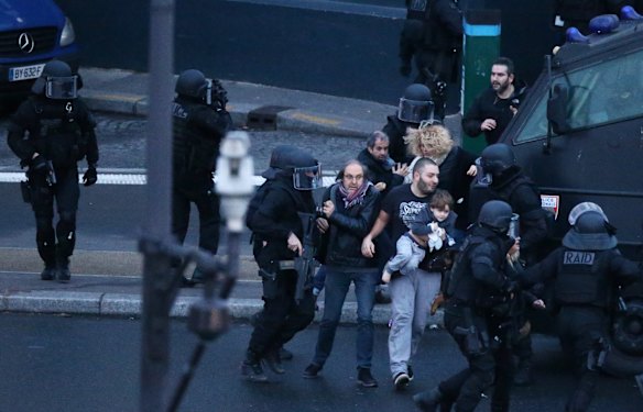 Hostages are liberated after an assault by the police at a kosher grocery store Hyper Cacher in Porte de Vincennes, Paris.
