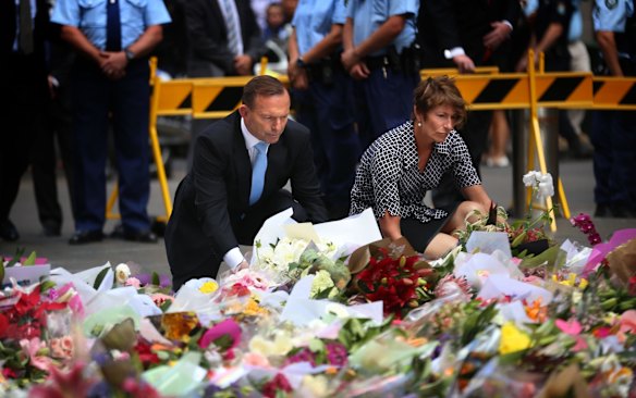  Prime Minister Tony Abbott and partner Margaret arrive at Martin Place, Sydney to lay a bouquet of flowers. 