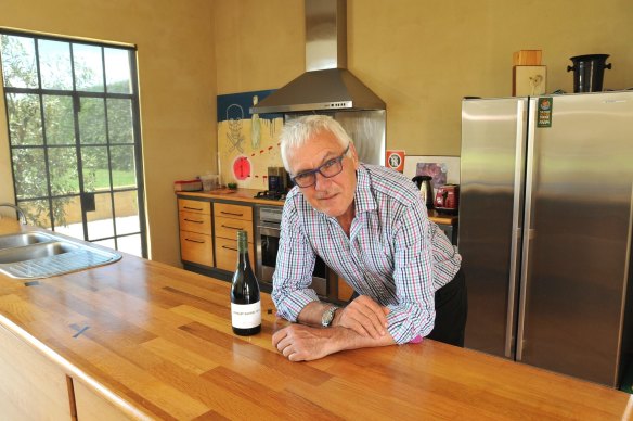Winemaker Philip Shaw in his home, which is surrounded by his vineyards in Orange NSW. All the joinery is made from oak vats.