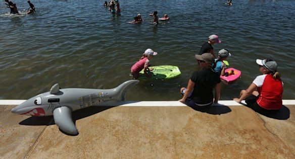 People head down to the children section of the Merewether Ocean Baths to cool down.