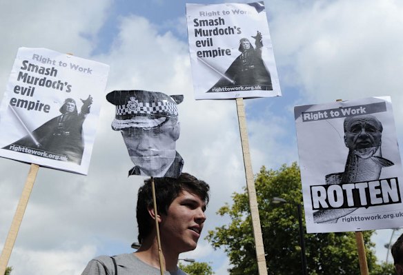 Protesters outside the hearing.