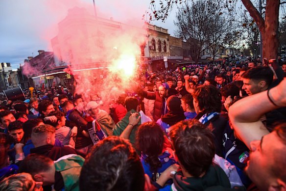 Italian soccer fans celebrate in Lygon Street, Carlton, after Italy won the Euro 2020 final against England at Wembley Stadium in London.
