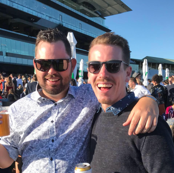 Aaron Wilson at the races with a mate.