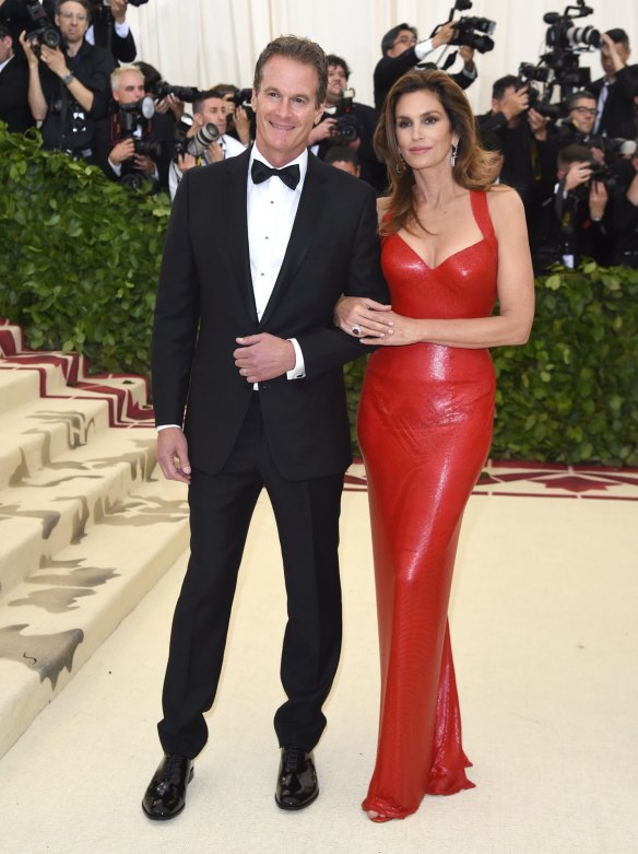 Rande Gerber, left, and Cindy Crawford attend The Metropolitan Museum of Art's Costume Institute benefit gala celebrating the opening of the Heavenly Bodies: Fashion and the Catholic Imagination exhibition on Monday, May 7, 2018, in New York.
