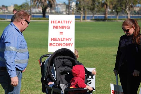 About 1200 mining workers and families told Kevin Rudd to 'axe the tax'. Photo: Chalpat Sonti