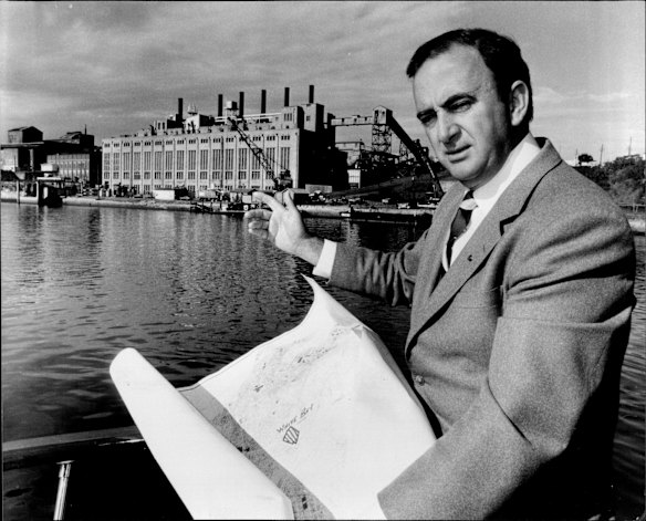 Bruce MacDonald in front of the sites of Balmain Power Station. Leader of the State Opposition Mr. Bruce MacDonald announced Liberal Party planes to develop Balmain, Bunnerong and White Bay, Pyrmont Power stations sites into residential area. July 01, 1981.