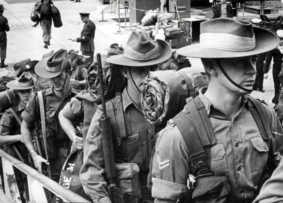 Troops board the HMAS Sydney at Garden Island bound for Vietnam on 25 May 1966