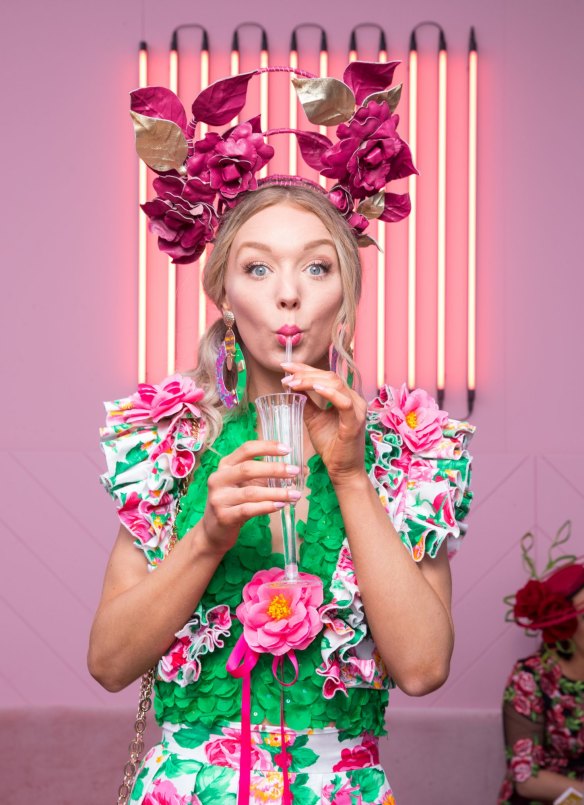 Samantha Hall-Hanson in a JP Couture dress and Linda Watt Millinery.