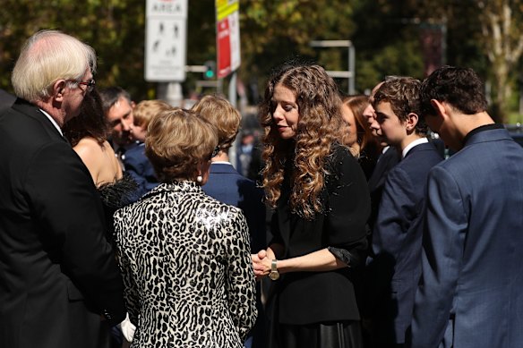 Bianca Spender speaks with the Governor of NSW Margaret Beazley following the state funeral for Carla Zampatti.