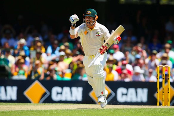 Australia's batsman David Warner celebrates his unbeaten century.