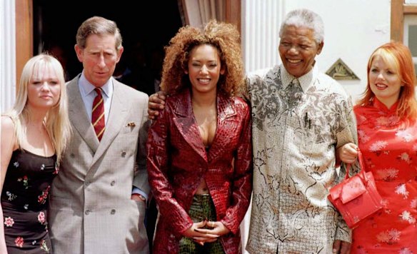 Britain's Prince Charles, left, and the President of South Africa Nelson Mandela with members of the British pop group the Spice Girls, at President Mandela's offical presidential residence in Pretoria, 1997.