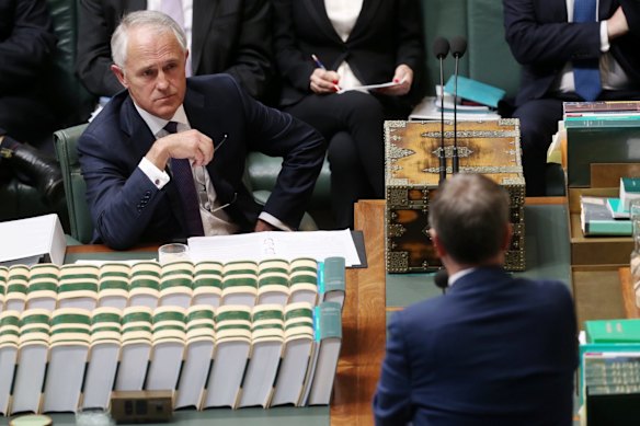 Prime Minister Malcolm Turnbull listens to Opposition Leader Bill Shorten during question time at Parliament House in Canberra on Tuesday 15 September 2015. 