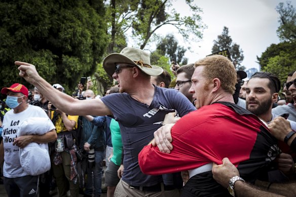 Police clash with protesters at the Shrine.