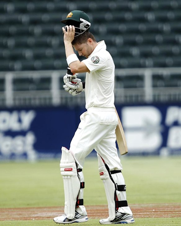 Michael Clarke leaves the field, disappointed, after he was bowled by Vernon Philander for two.