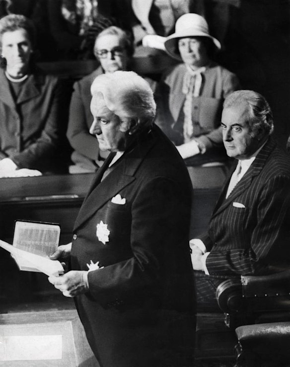 Swearing in of the new Governor General, Sir John Kerr, by the acting Cheif Justice of Australia, Sir Edward McTiernan, in the Senate Chamber of Parliament House, Canberra - Kerr holdsa a bible and to the left of pic is the Prime Minister Mr. Gough Whitlam, 11 July 1974.