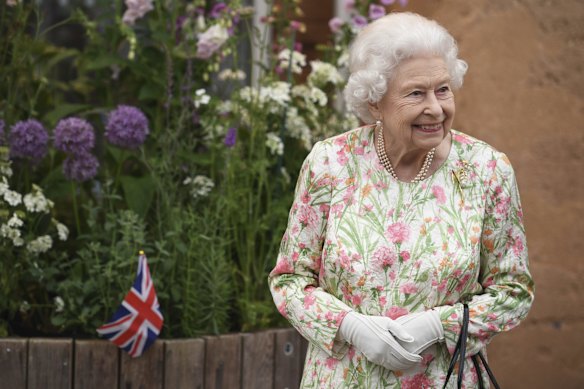 Britain's Queen Elizabeth II,  attends an event in celebration of 'The Big Lunch 'initiative, during the G7 summit in Cornwall, England, Friday June 11, 2021. 