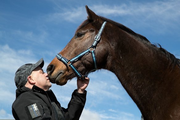 Retired serviceman Max Streeter, who suffers from PTSD, interacts with Vashka, a retired racing horse, as part of a equine therapy program run by Racing NSW in Capertee, NSW.
