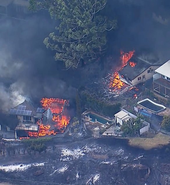 Homes are destroyed in the Koolewong fire. 