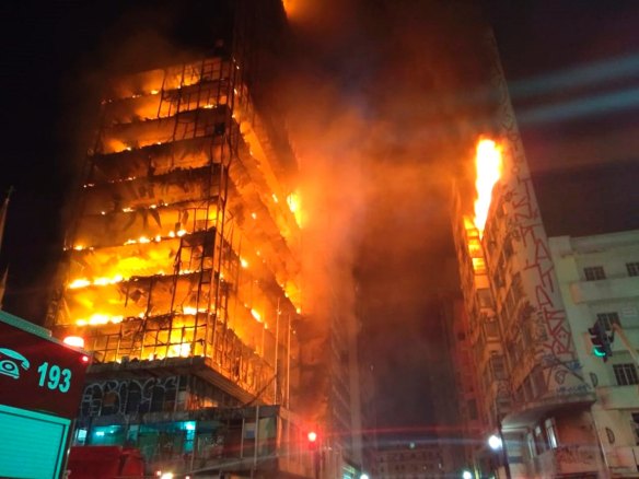 The burning building in downtown Sao Paulo, Brazil, which collapsed mid rescue in the early hours of Tuesday morning, local time.  