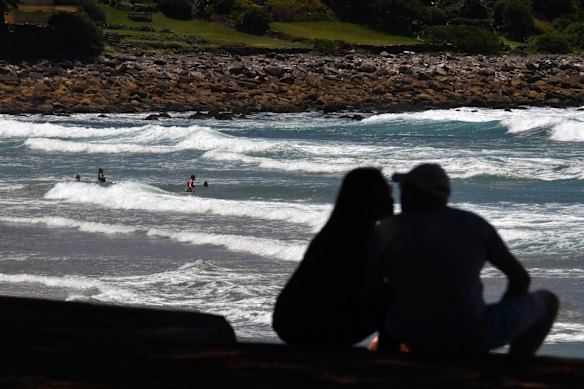 Beachgoers at Avalon Beach in Sydney. Northern beaches are preparing for an influx of visitors when lockdown ends.