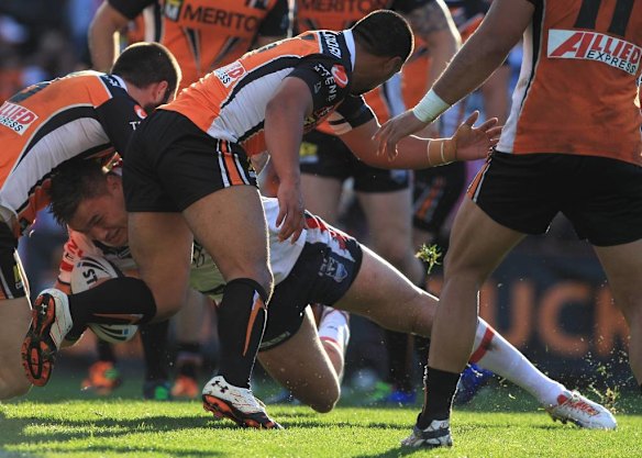 The Roosters' Jared Waerea-Hargreaves goes down.