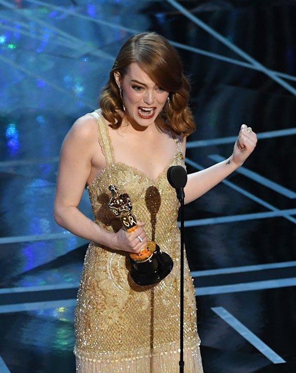 Emma Stone accepts the Oscar for best actress for her perfomance in <i>La La Land</i>.