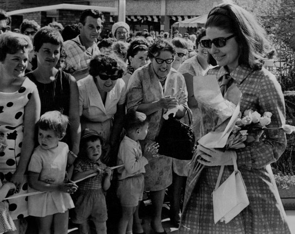 Princess Soraya passes by the crowd of thousands of shoppers who waited to greet her. November 3, 1967.