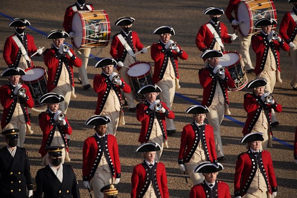 A historic military marching band walks on Pennsylvania Avenue during the 59th presidential inauguration parade in Washington, D.C., U.S., on Wednesday, Jan. 20, 2021. 