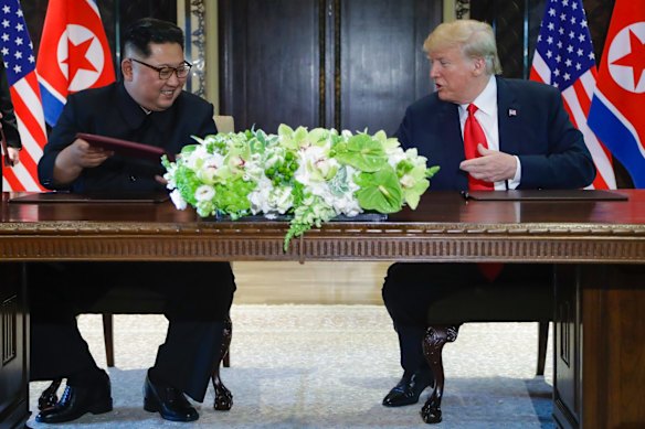 North Korea leader Kim Jong Un and U.S. President Donald Trump exchanged signed documents at the Capella resort.