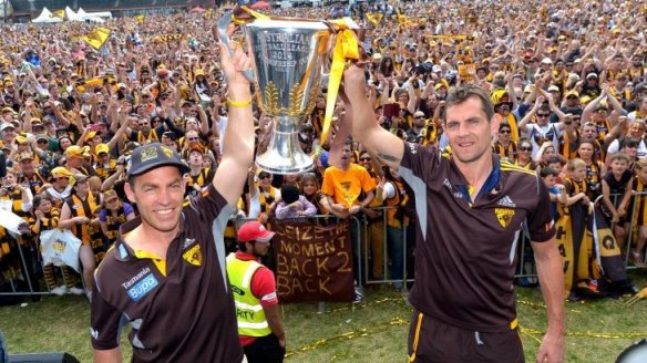 Those were the days: Alastair Clarkson and Luke Hodge enjoy the ultimate success. Now Clarkson hopes to achieve this with the Kangaroos.